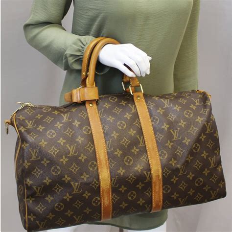 louis vuitton reflective duffle bag|louis vuitton duffle bag women's.